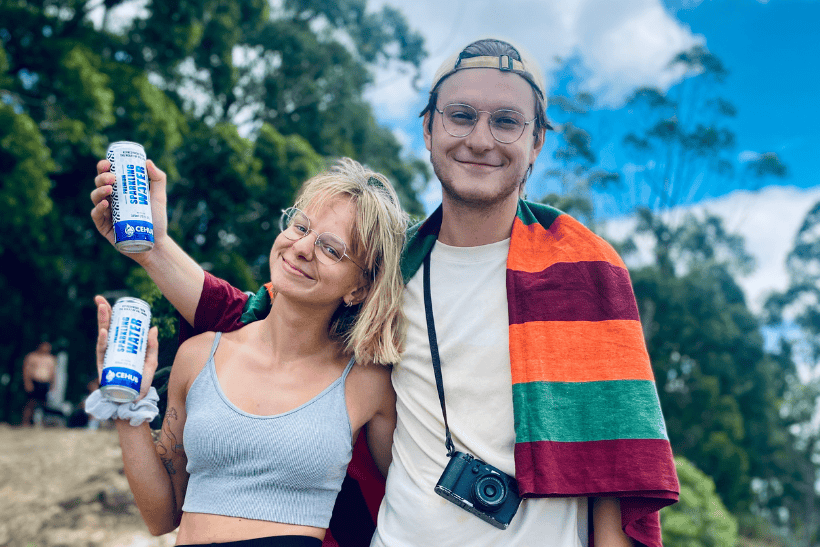 Tourists enjoying CEHub Sparkling Water while exploring Sri Lanka’s scenic travel destinations